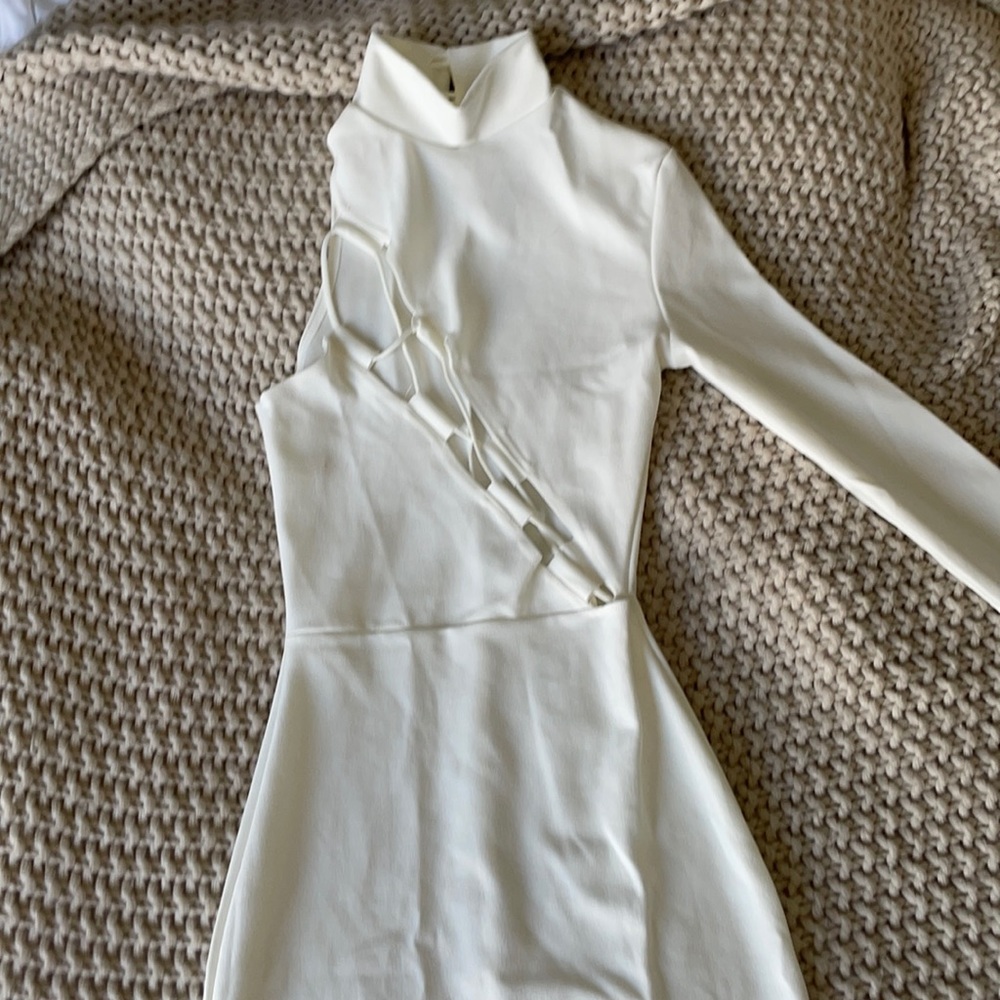 Single sleeve white cut-out dress